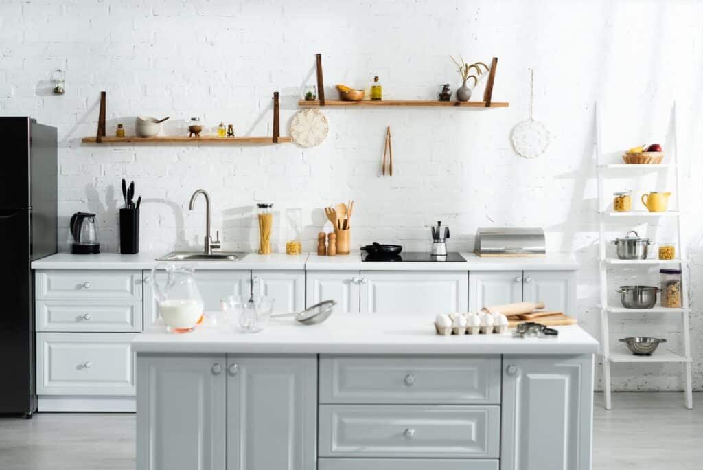 interior of kitchen with cooking utensils food milk and kitchenware